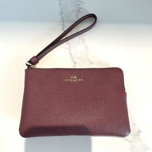 Beautiful dark tea rose Coach wristlet